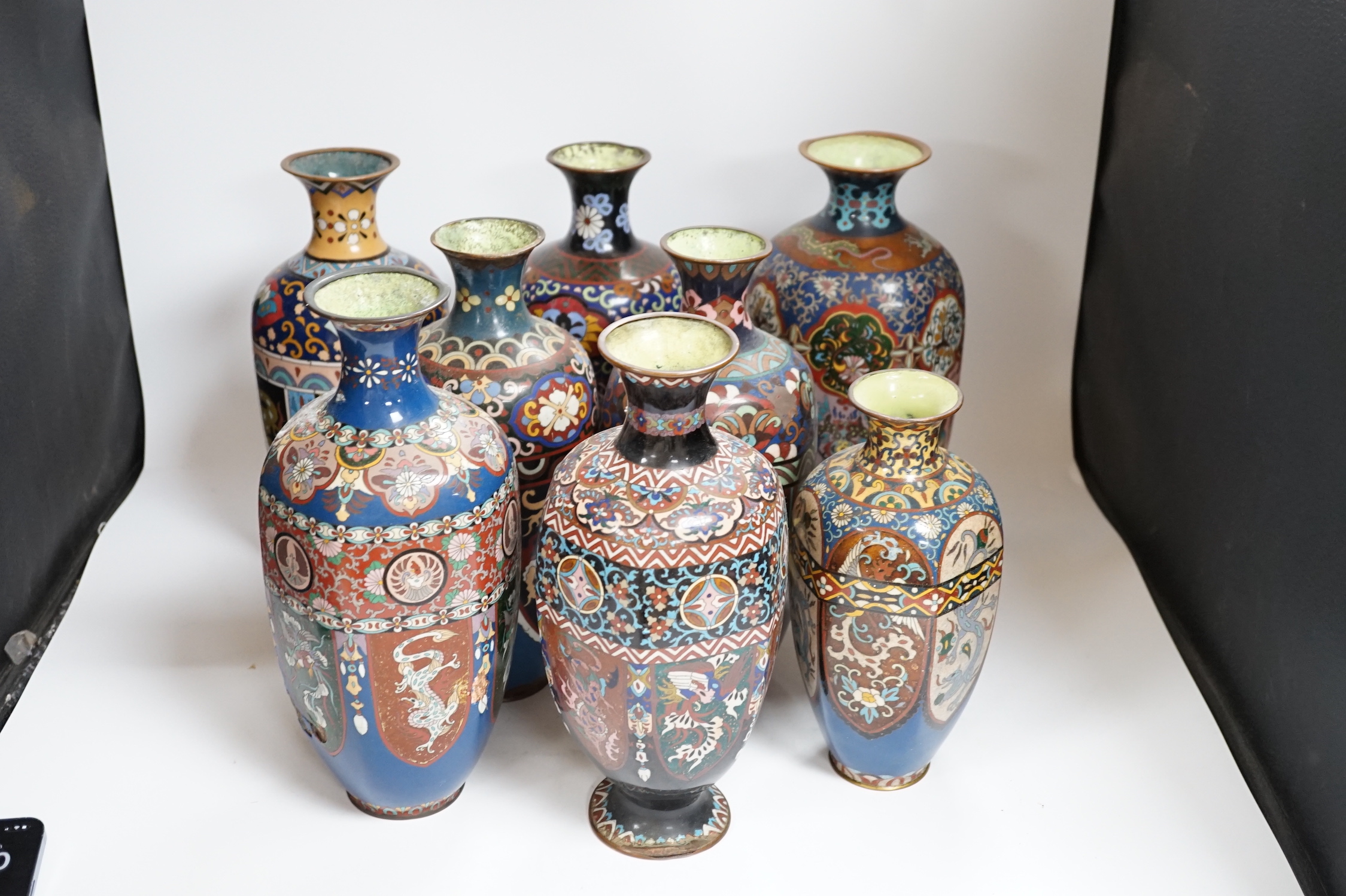 Eight Japanese cloisonné enamel vases, early 20th century, largest 30cm high